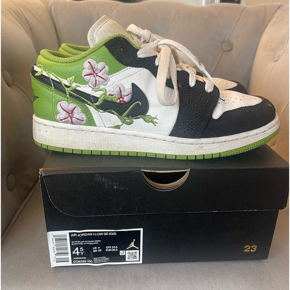 Girls Nike Air Jordan’s size 4.5 Adorable with flowers. Worn a handful of times
